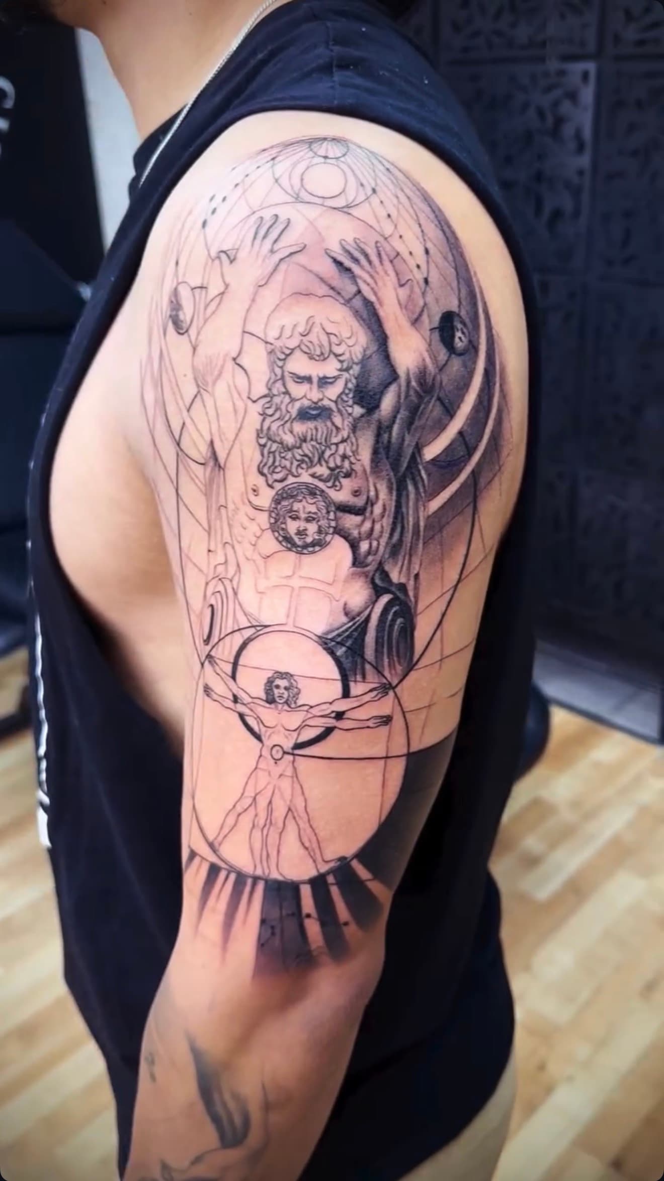 Black and grey classical figure shoulder tattoo by Cioffi Tattoo